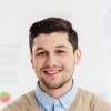 portrait-of-smiling-marketing-manager-with-arms-cr-2023-11-27-05-09-53-utc-1.jpg
